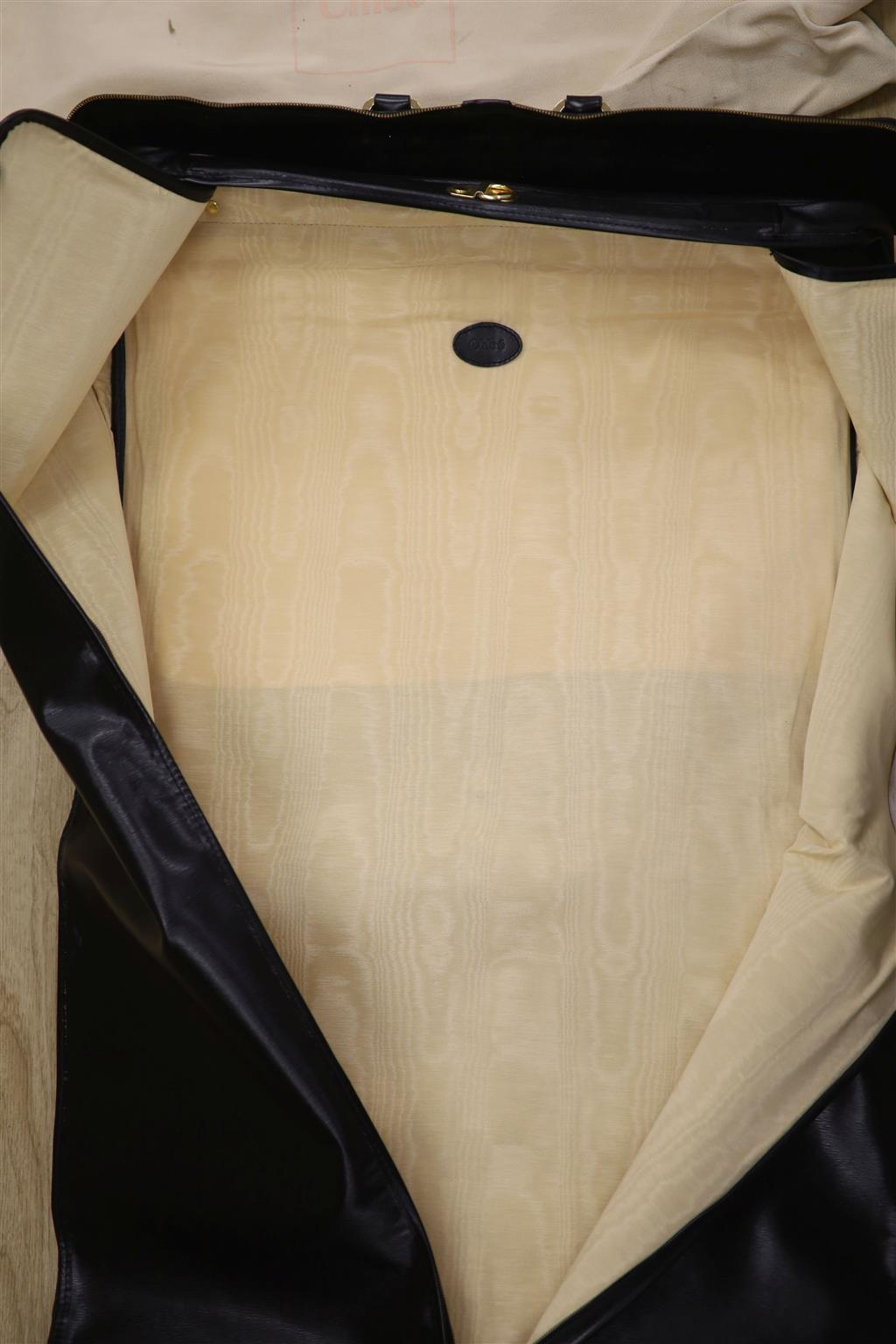 A Chloe folding suit bag, fully open 1.3 metres including handles